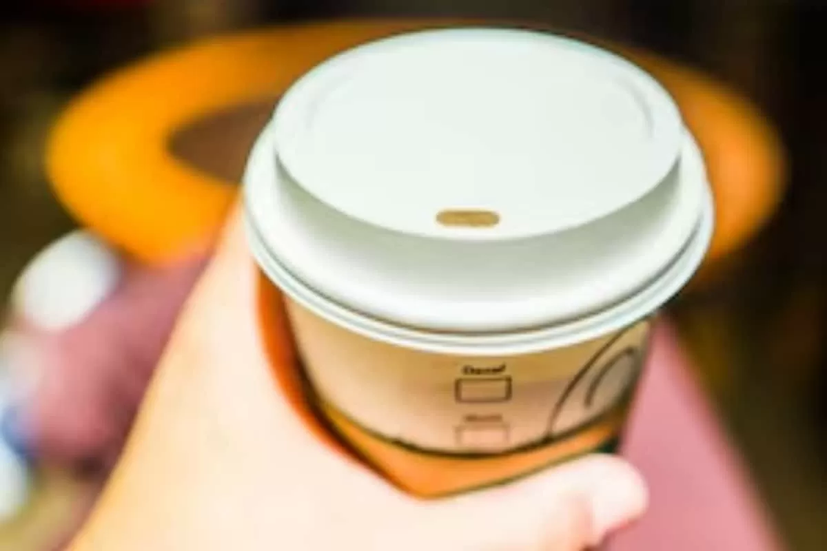 That Small Hole In Your Coffee Cup Lid? Here’s What It Actually Does