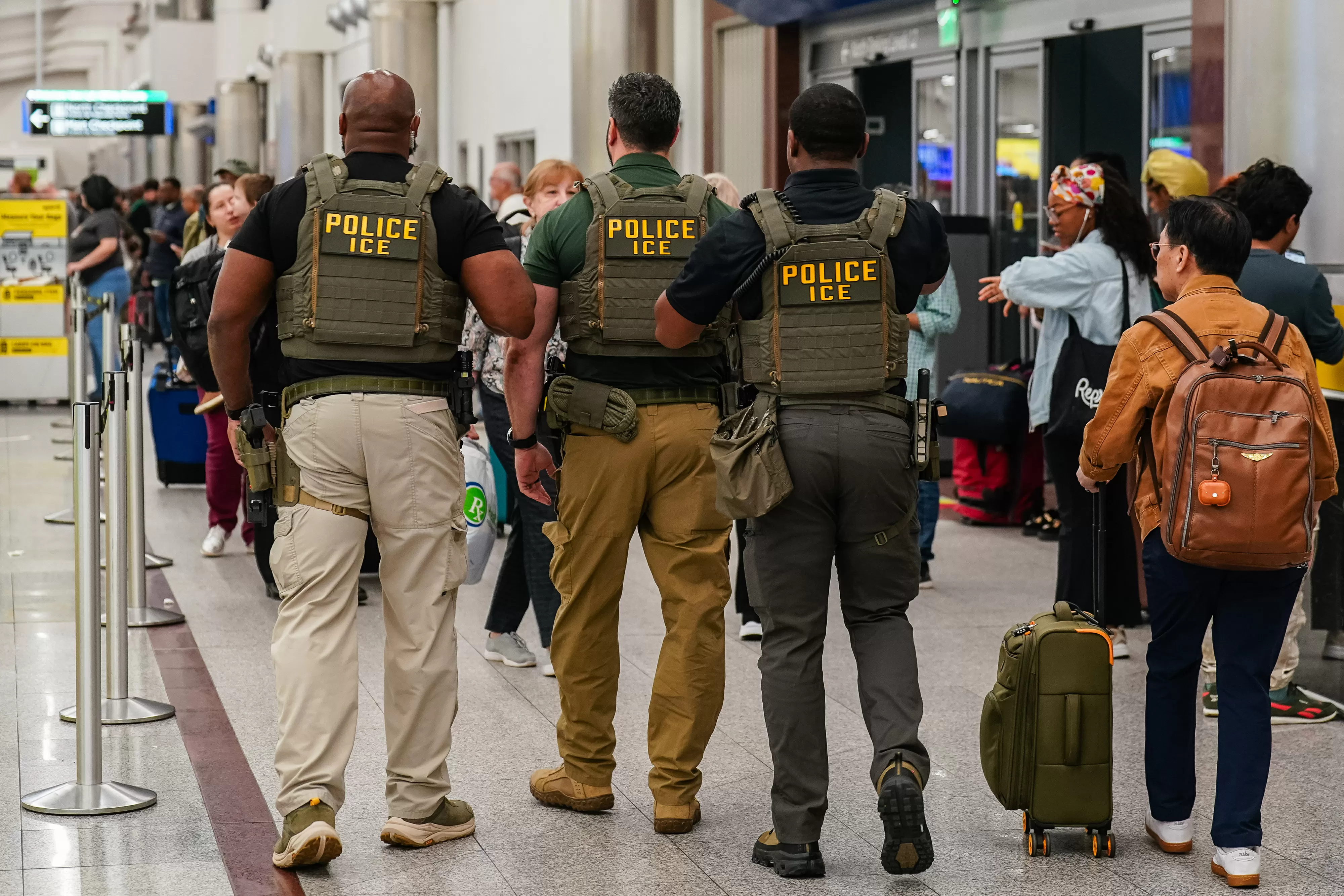 Trump: ICE officers 'rehabbing a fake image' by helping with bags at airports, cleaning